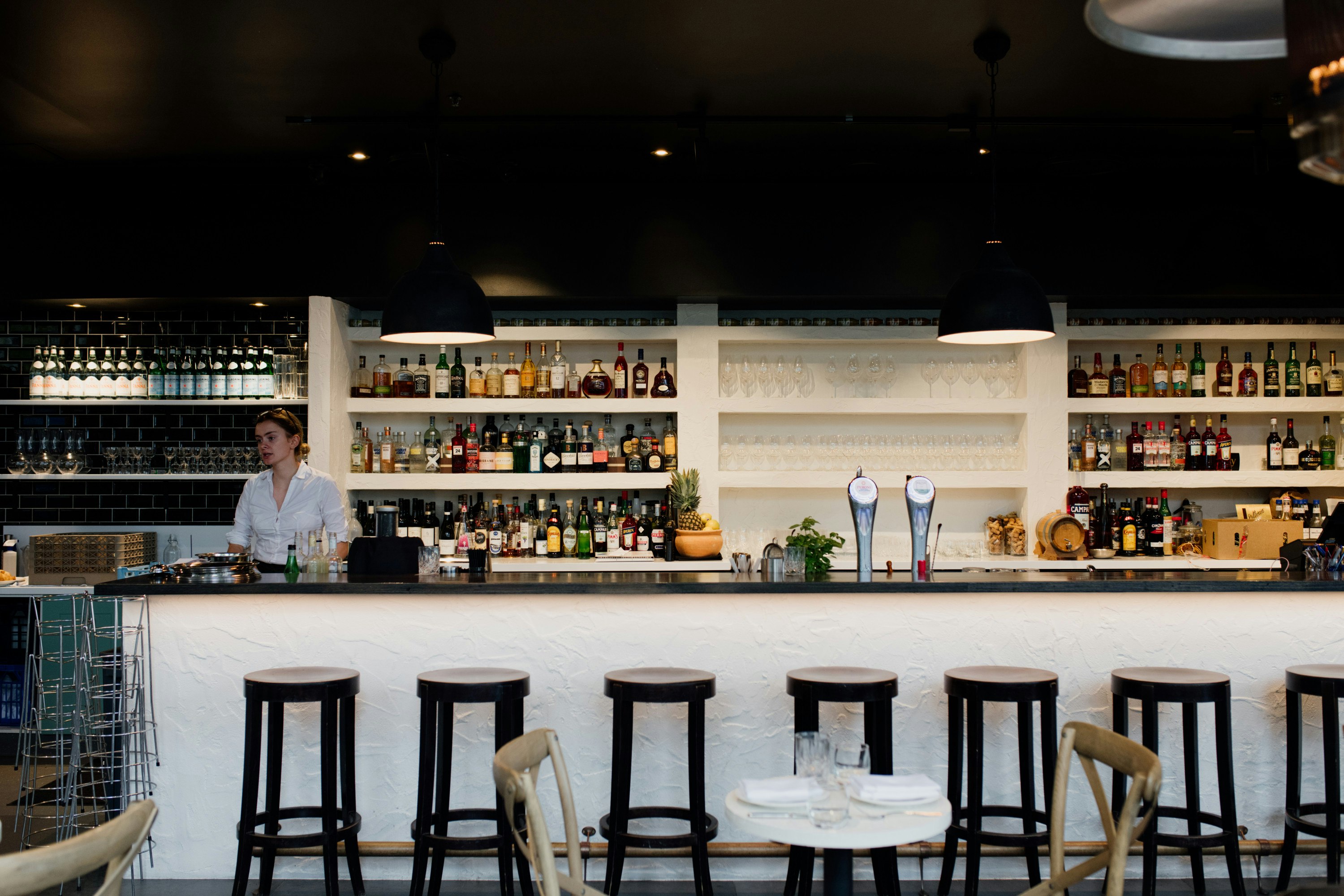 a sleek, dark bar at a restaurant